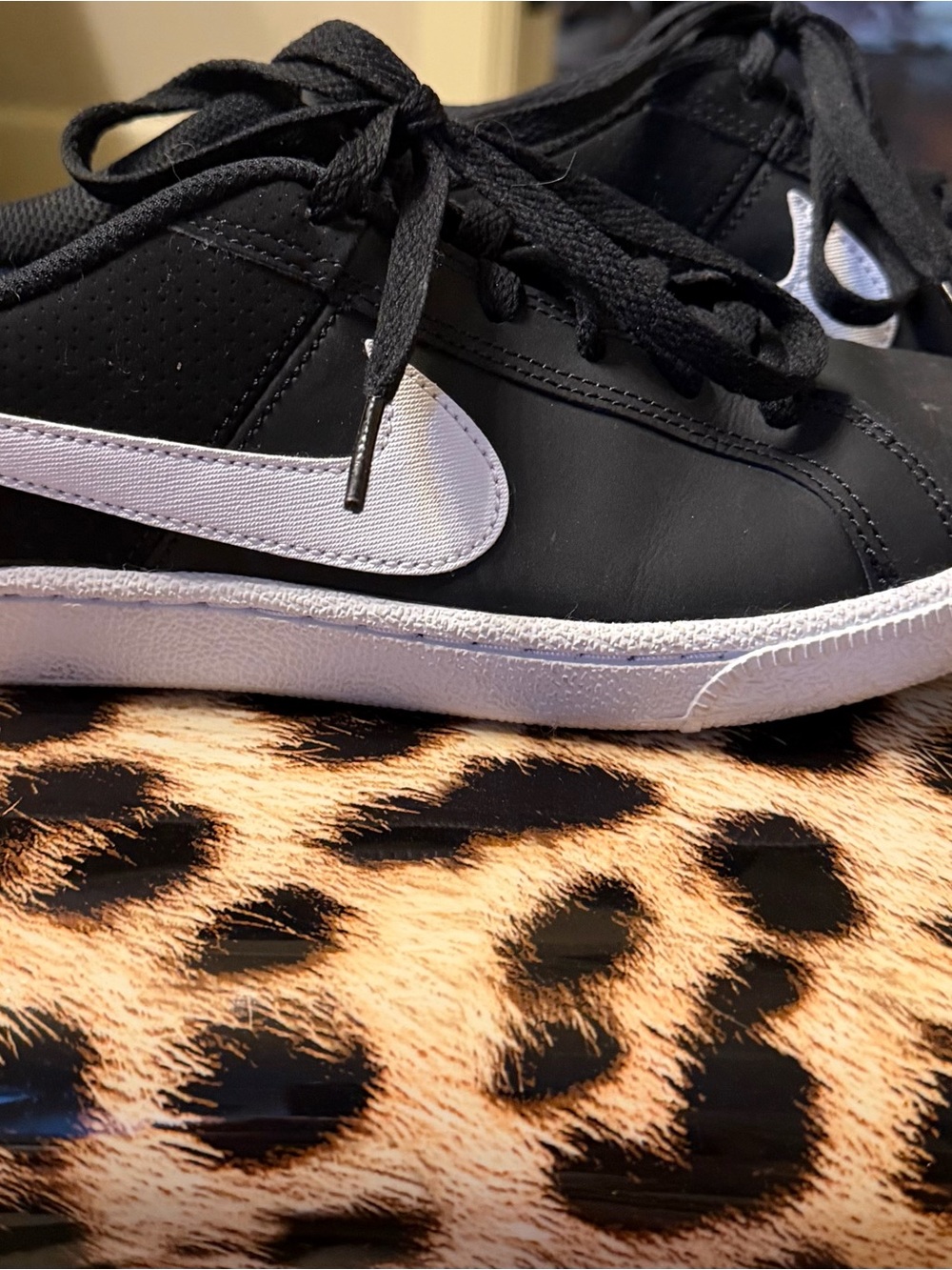 Nike Women’s Black Sneakers with White Swoosh